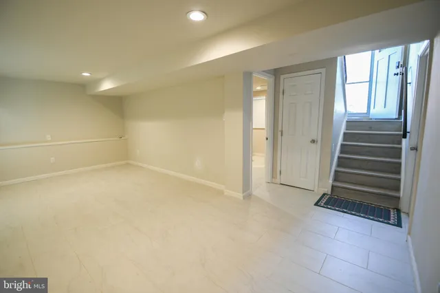 en empty room with windows