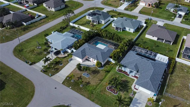 an aerial view of a house with a garden
