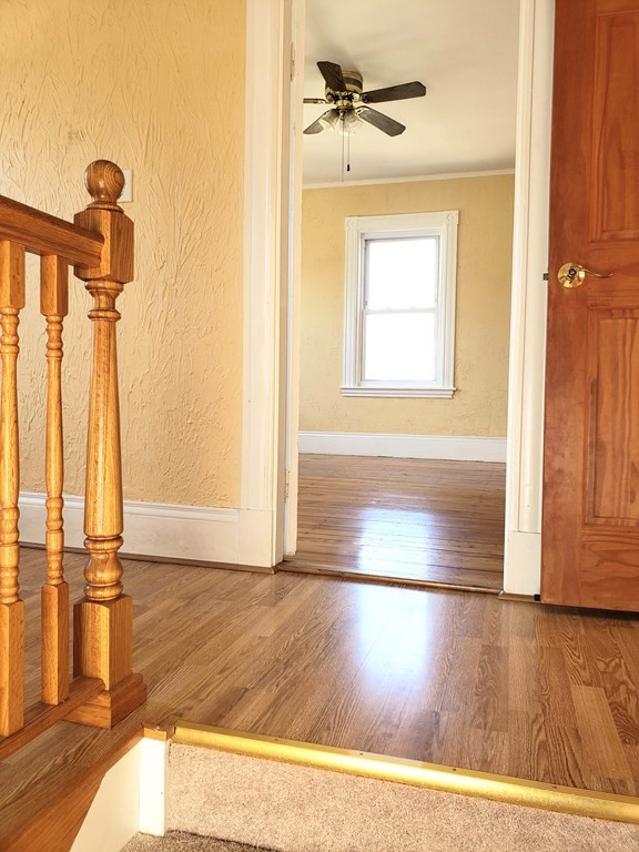 63 Irving Street Everett, MA 02149 - Photo 3 of 8 a view of a living room with a wooden floor