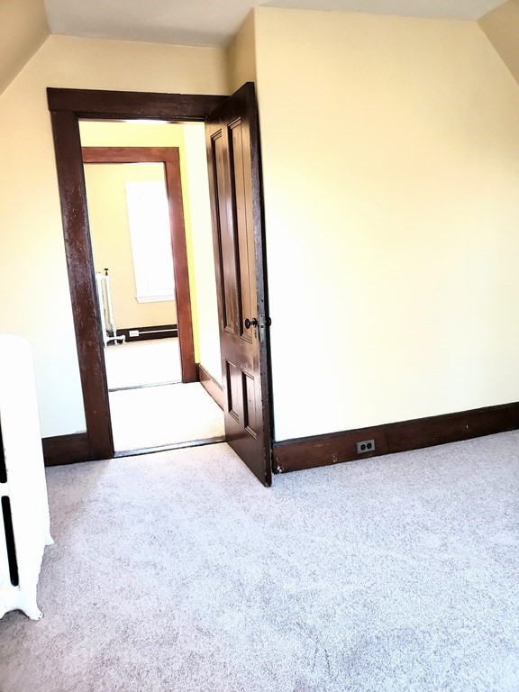 63 Irving Street Everett, MA 02149 - Photo 7 of 8 an entryway with a window