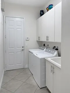 a view of a bathroom with a sink and vanity