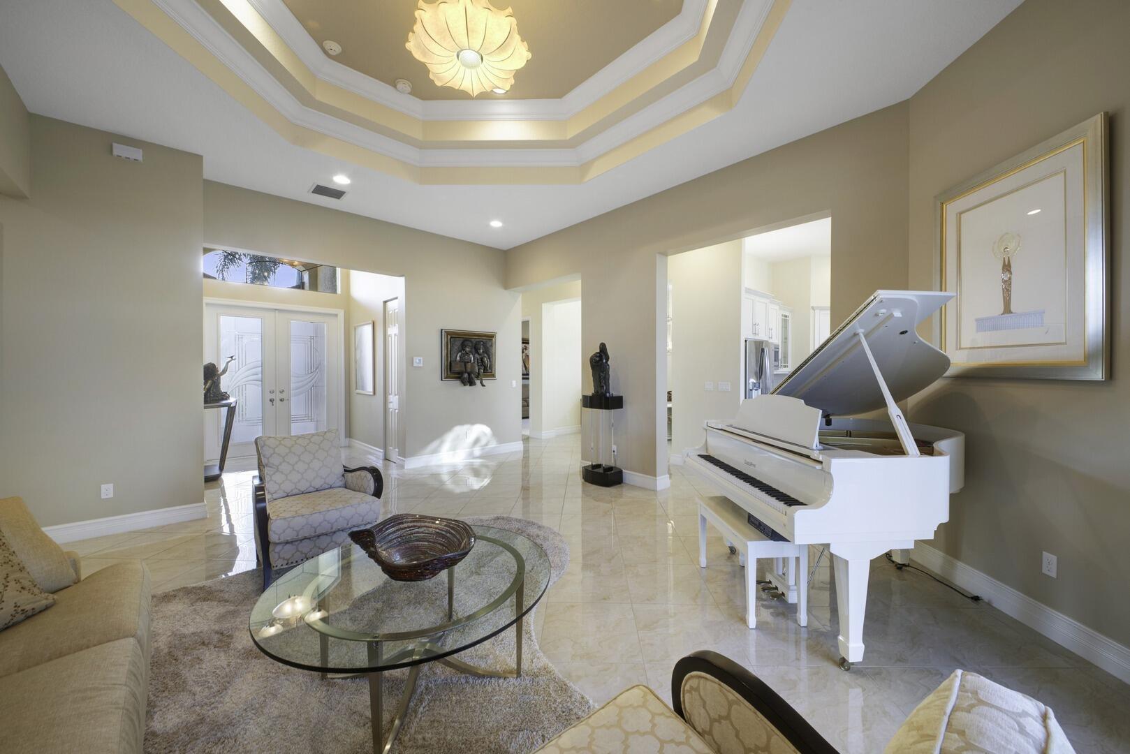 8289 Razorback Court Boynton Beach, FL 33473 - Photo 3 of 51 a living room with furniture and wooden floor