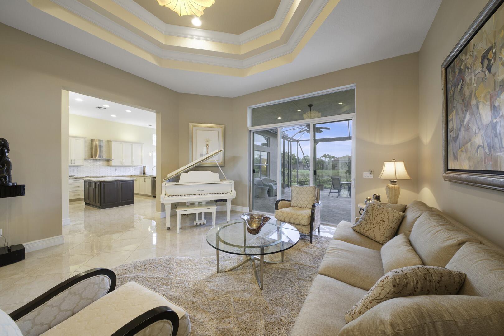 8289 Razorback Court Boynton Beach, FL 33473 - Photo 4 of 51 a living room with furniture and a large window