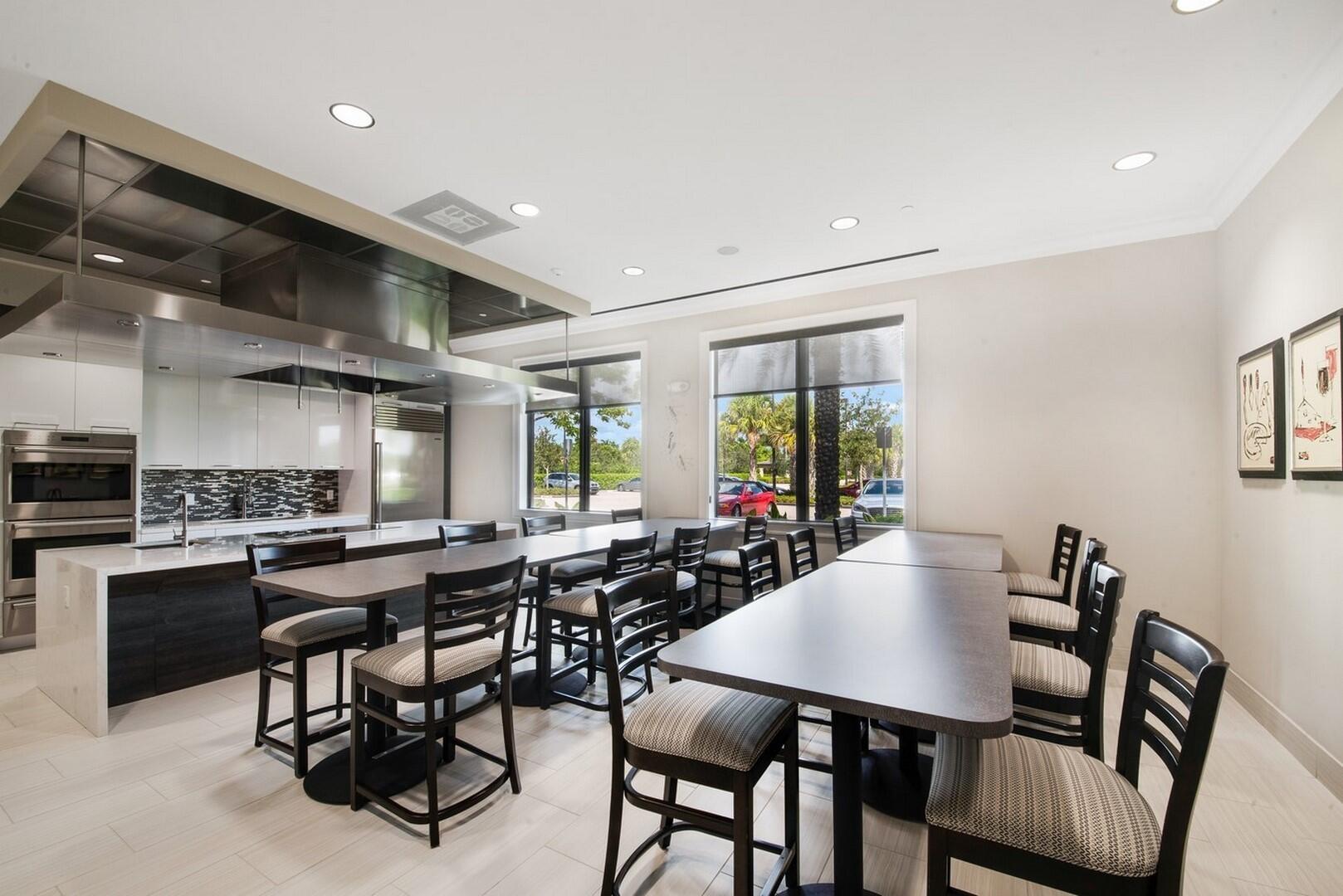 8289 Razorback Court Boynton Beach, FL 33473 - Photo 44 of 51 a view of a dining room with furniture and a large window