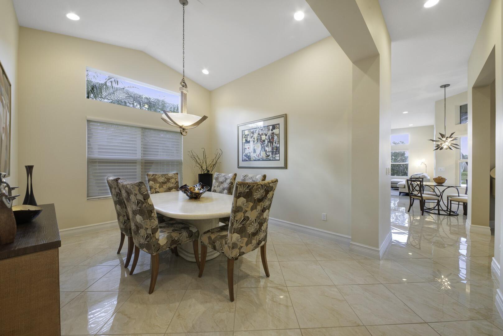 8289 Razorback Court Boynton Beach, FL 33473 - Photo 6 of 51 a view of a dining room with furniture
