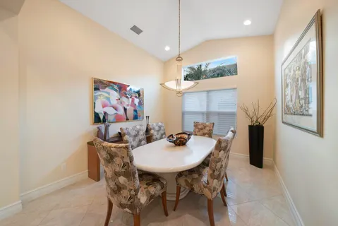a view of a dining room with furniture