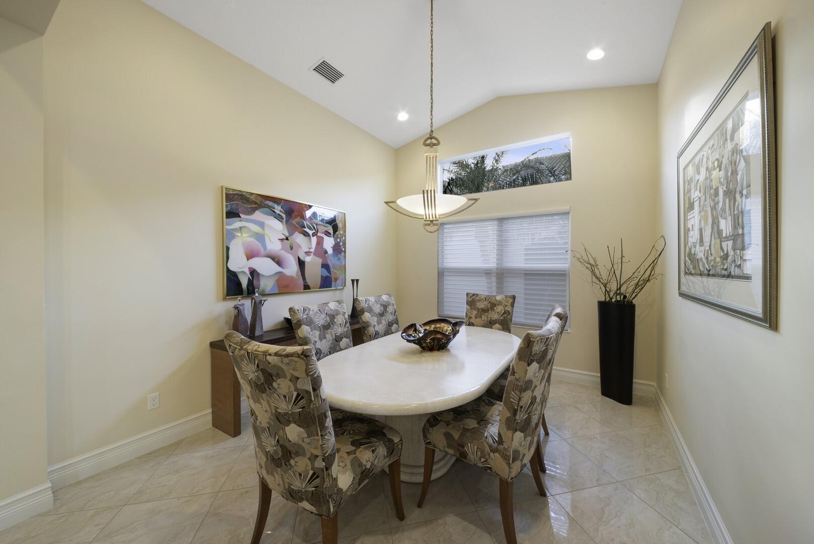 8289 Razorback Court Boynton Beach, FL 33473 - Photo 7 of 51 a view of a dining room with furniture