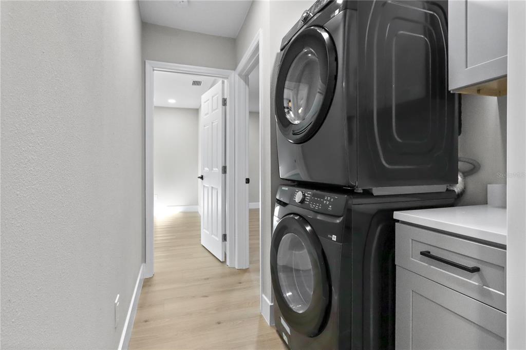772 Palmer Road Belleair Bluffs, FL 33770 - Photo 14 of 26 a utility room with dryer and washer
