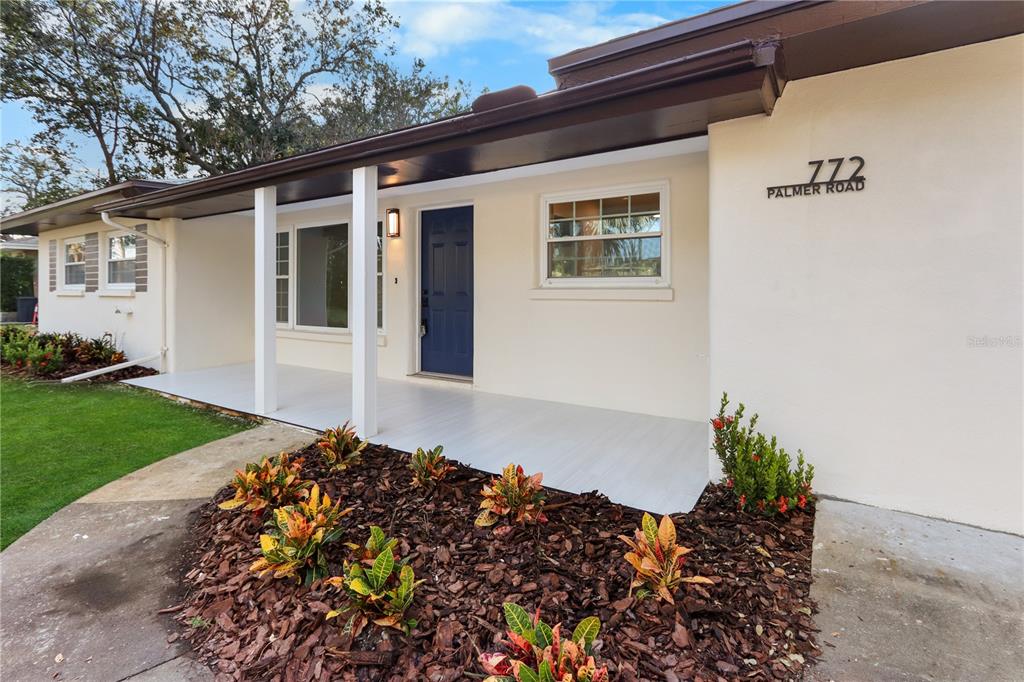 772 Palmer Road Belleair Bluffs, FL 33770 - Photo 21 of 26 a front view of a house with a yard