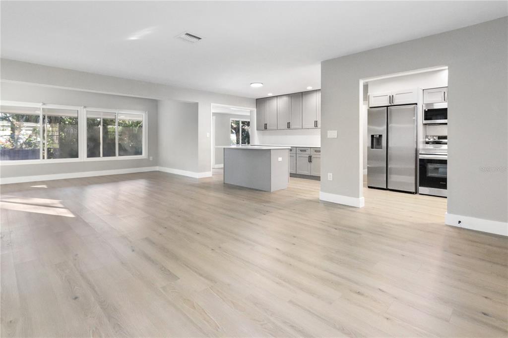 772 Palmer Road Belleair Bluffs, FL 33770 - Photo 4 of 26 a view of a kitchen with a sink and a large window