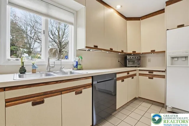 a view of a livingroom with furniture and a flat screen tv