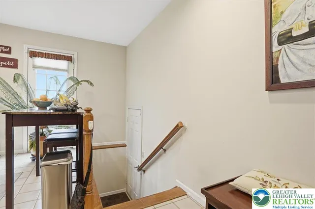a workspace with furniture and a potted plant