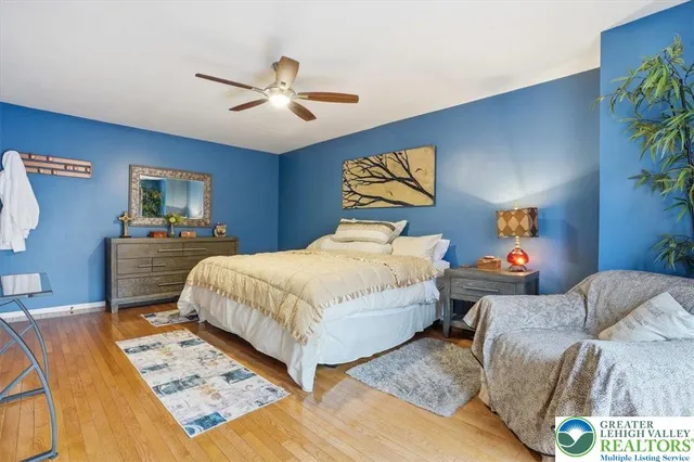 a aerial view of a house with a yard