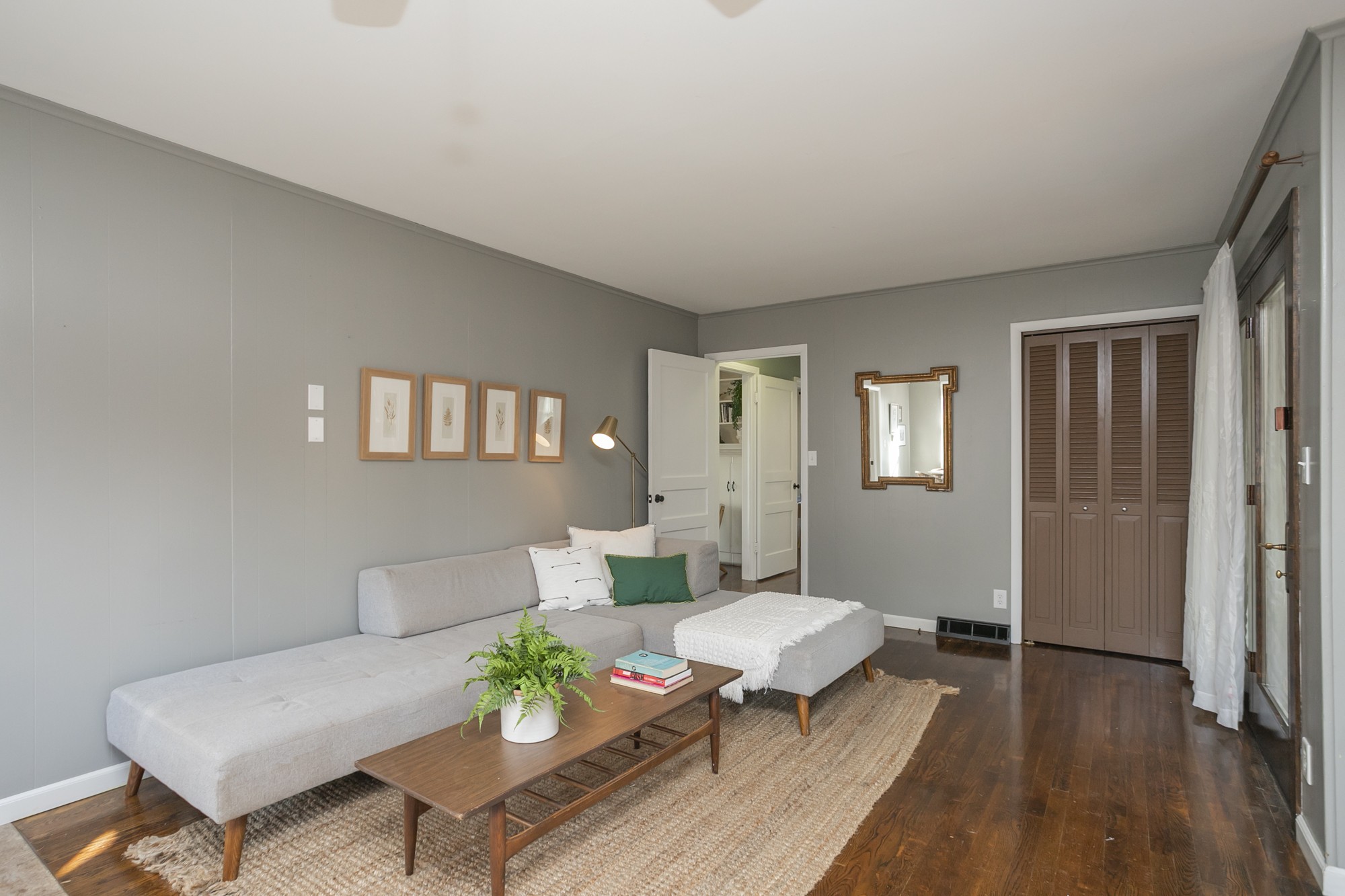 1018 Mitchell Road Nashville, TN 37206 - Photo 14 of 44 a living room with furniture a table and wooden floor