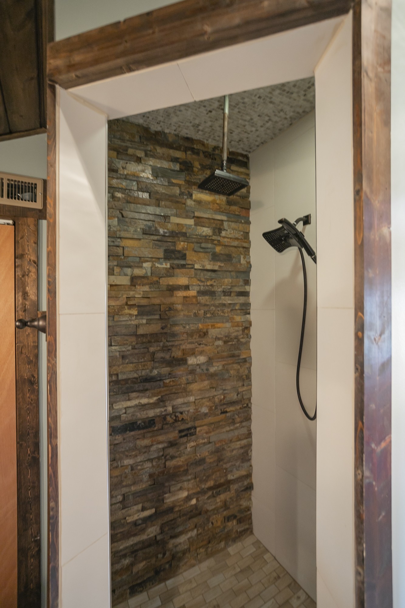 1018 Mitchell Road Nashville, TN 37206 - Photo 23 of 44 a bathroom with a glass shower door
