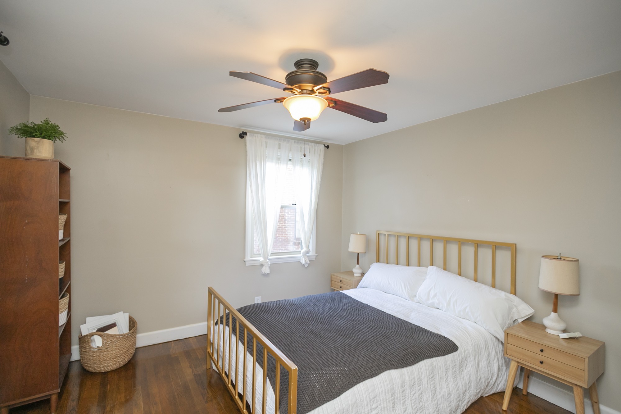 1018 Mitchell Road Nashville, TN 37206 - Photo 26 of 44 a bedroom with a bed and a chandelier