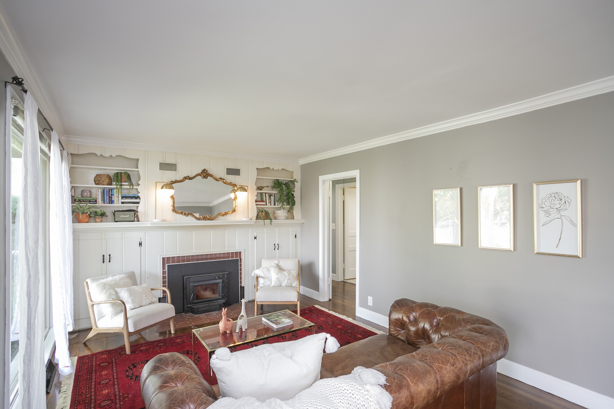 1018 Mitchell Road Nashville, TN 37206 - Photo 3 of 44 a living room with furniture a fireplace and a window
