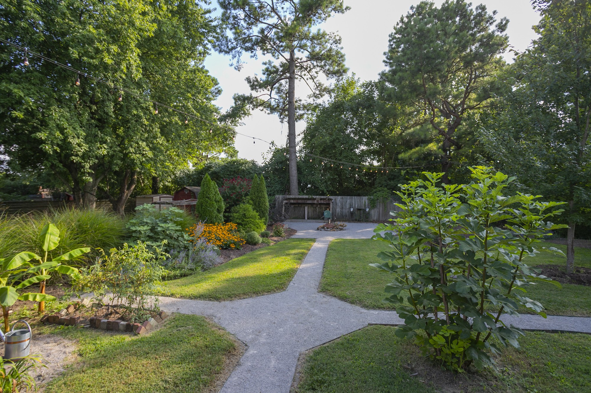 1018 Mitchell Road Nashville, TN 37206 - Photo 34 of 44 a view of a garden with a bench