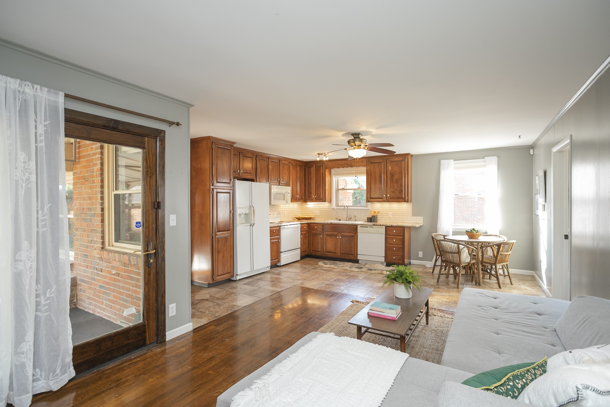 1018 Mitchell Road Nashville, TN 37206 - Photo 10 of 44 a living room with lots of furniture and kitchen view