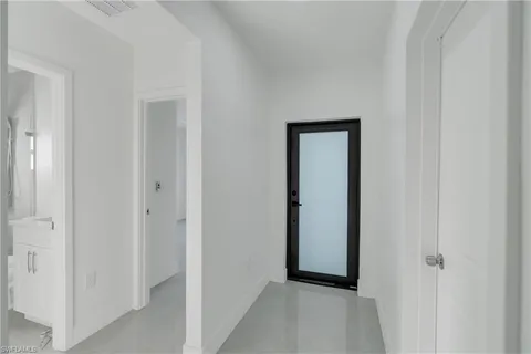 a view of a hallway with closet