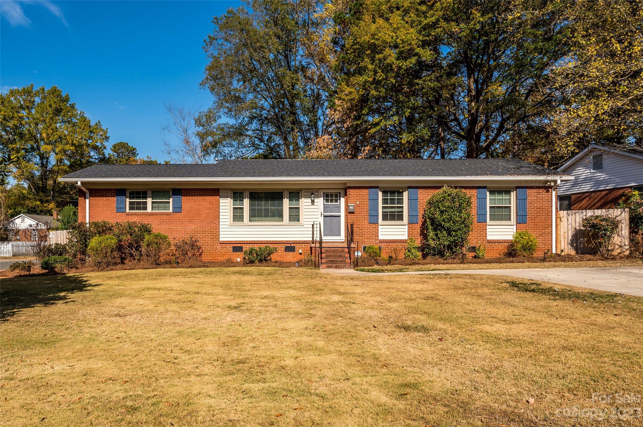 front view of a house with a swimming pool