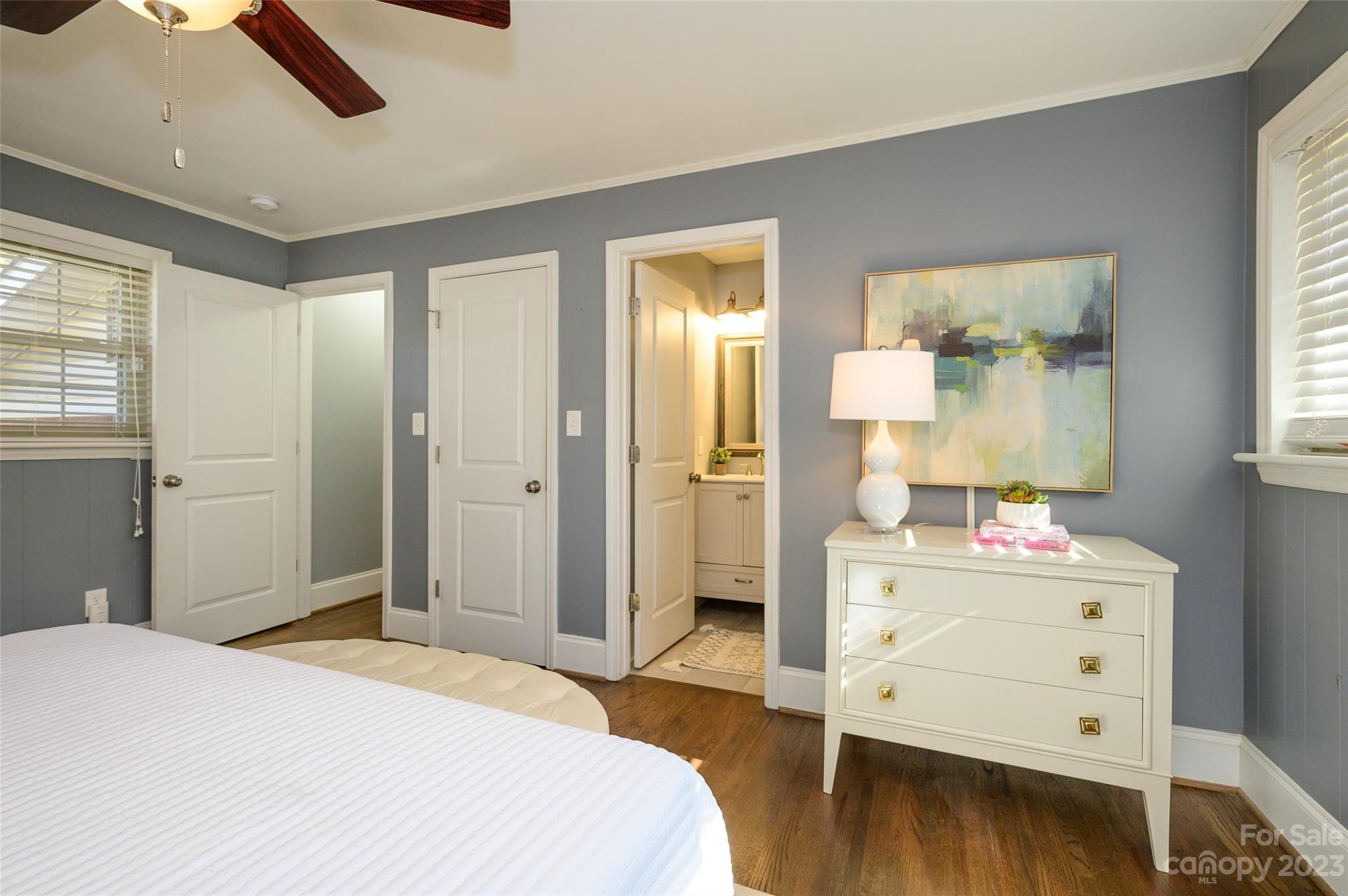 2901 Enfield Road Charlotte, NC 28205 - Photo 18 of 29 a bedroom with a bed and a dresser in it