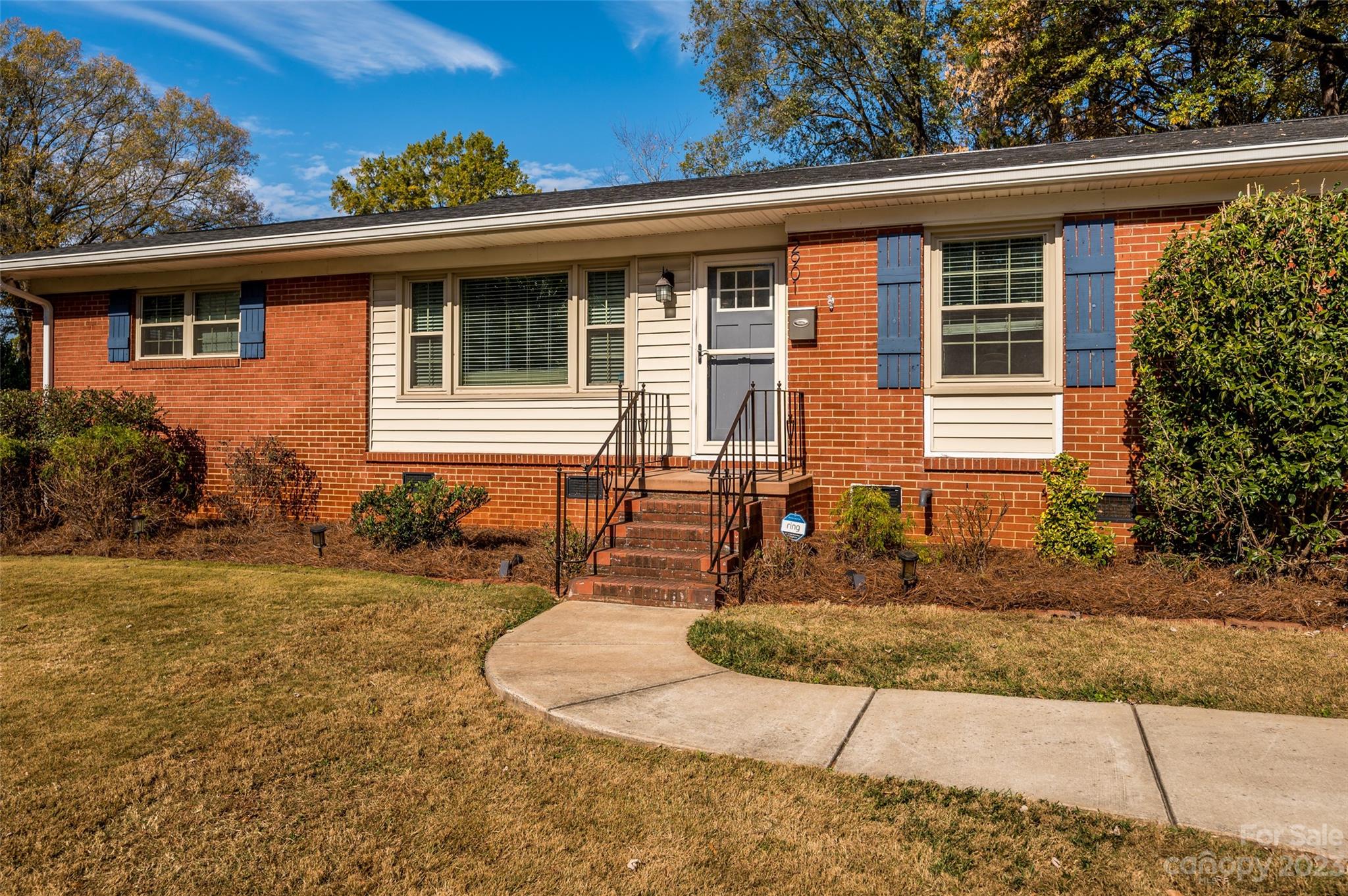 2901 Enfield Road Charlotte, NC 28205 - Photo 2 of 29 a front view of a house with garden