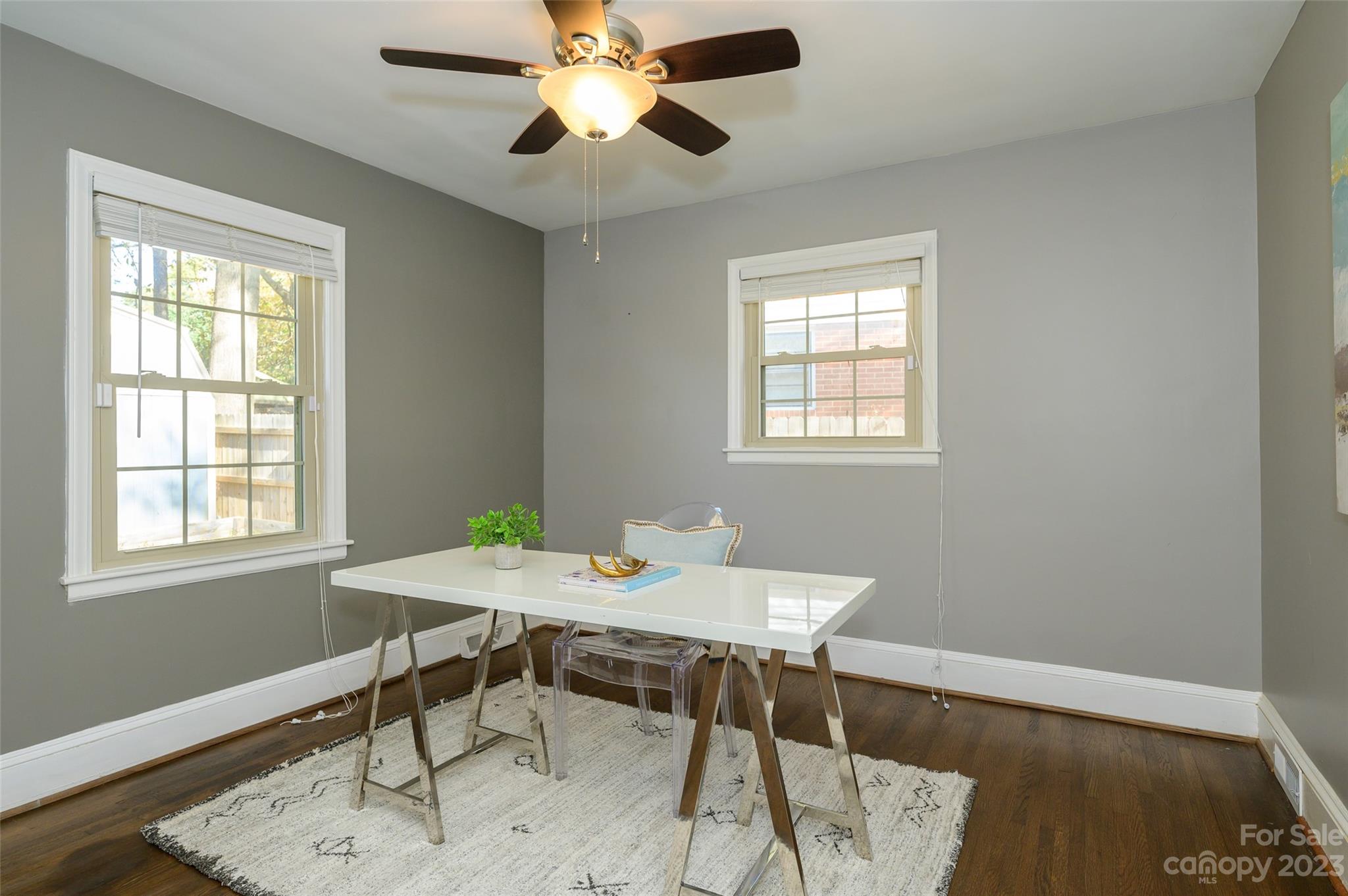 2901 Enfield Road Charlotte, NC 28205 - Photo 22 of 29 a workspace with wooden floor and a window