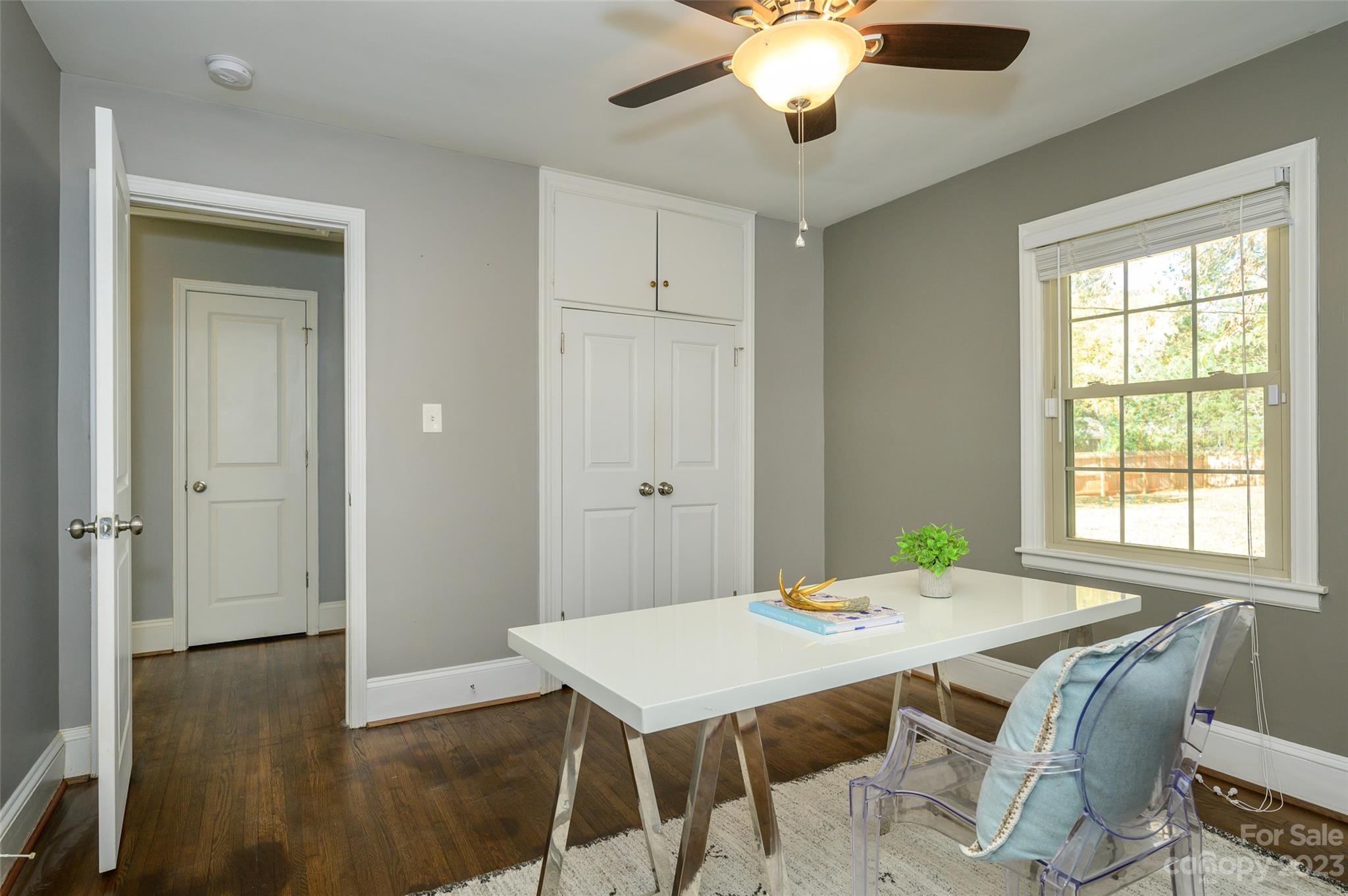 2901 Enfield Road Charlotte, NC 28205 - Photo 23 of 29 a view of a dining room with furniture window and wooden floor