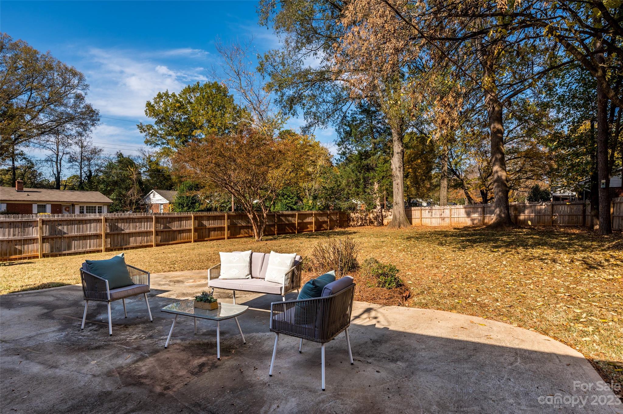 2901 Enfield Road Charlotte, NC 28205 - Photo 26 of 29 a backyard of a house with table and chairs