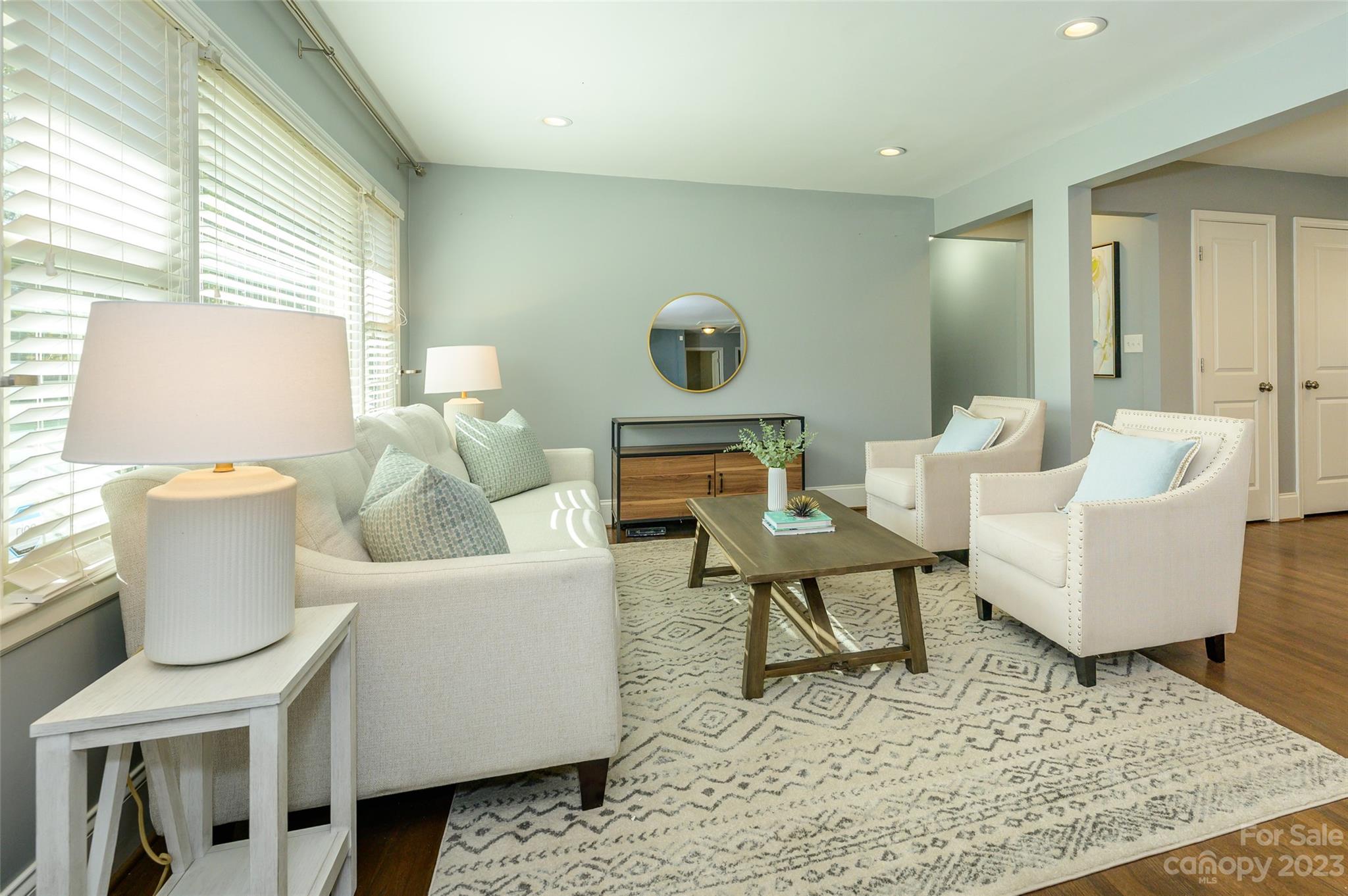 2901 Enfield Road Charlotte, NC 28205 - Photo 4 of 29 a living room with a couch and a coffee table