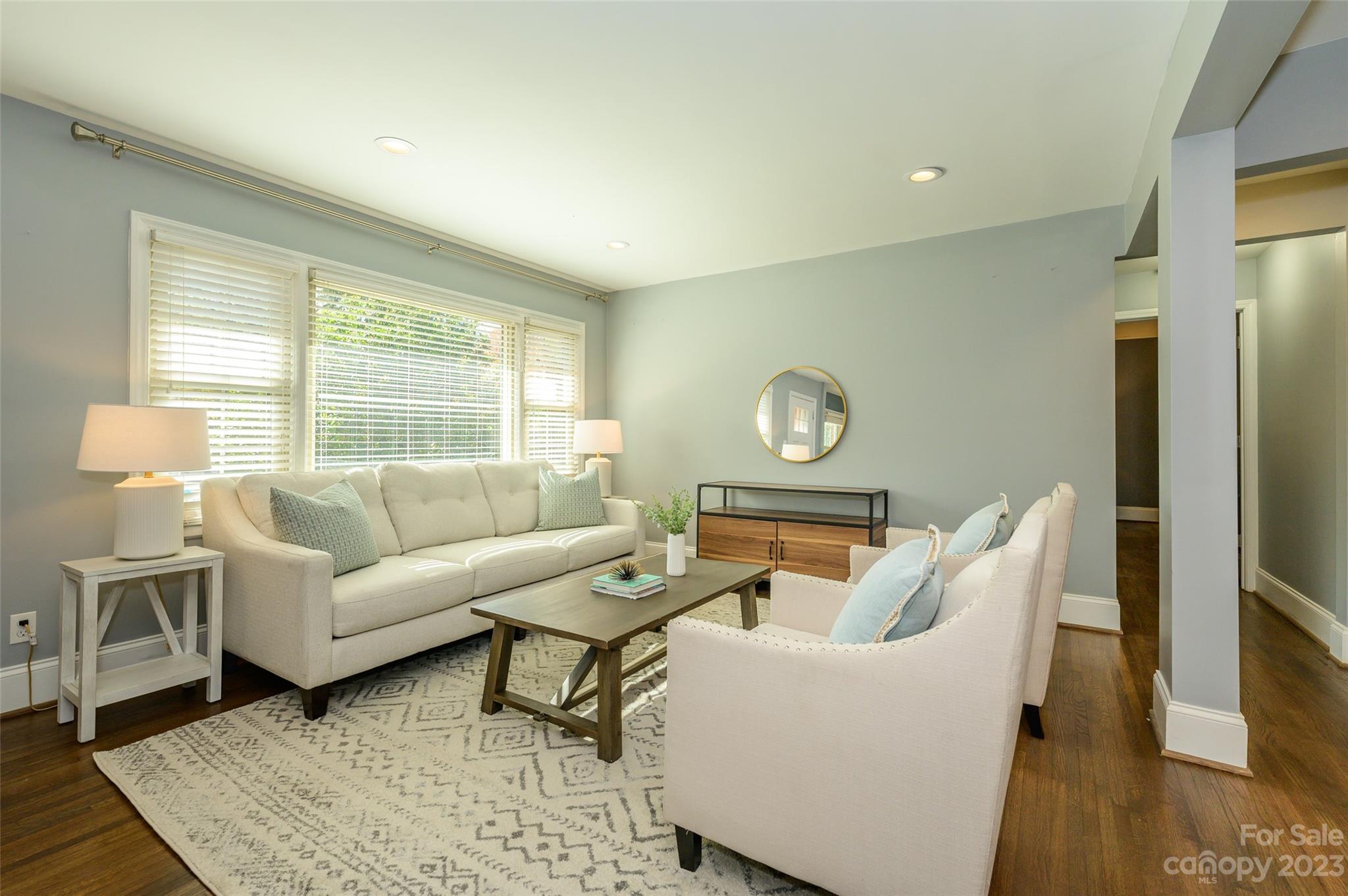 2901 Enfield Road Charlotte, NC 28205 - Photo 5 of 29 a living room with furniture and a window
