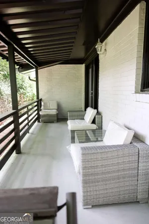 a backyard of a house with seating space