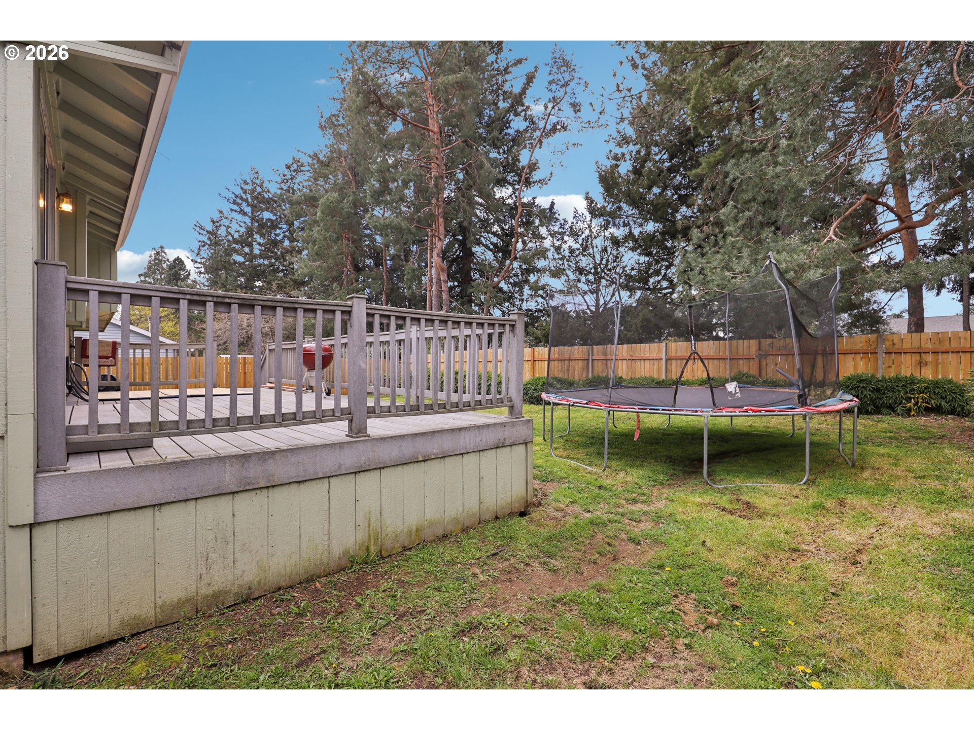 691 Southwest Linneman Court Gresham, OR 97030 - Photo 33 of 35 a view of swimming pool with a patio and fire pit
