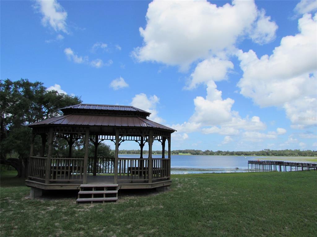 0 Southwest Big Bear Ridge Dunnellon, FL 34431 - Photo 9 of 19 a view of a chair and table on the garden