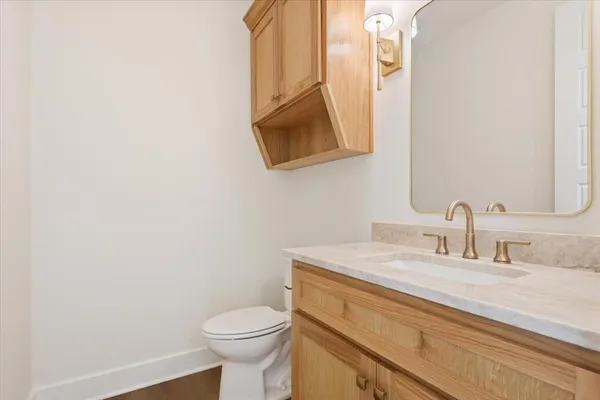 a bathroom with a sink a toilet and a bathtub