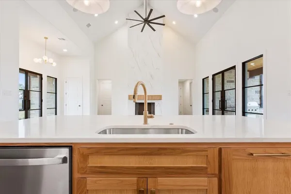 a kitchen with counter top space and appliances