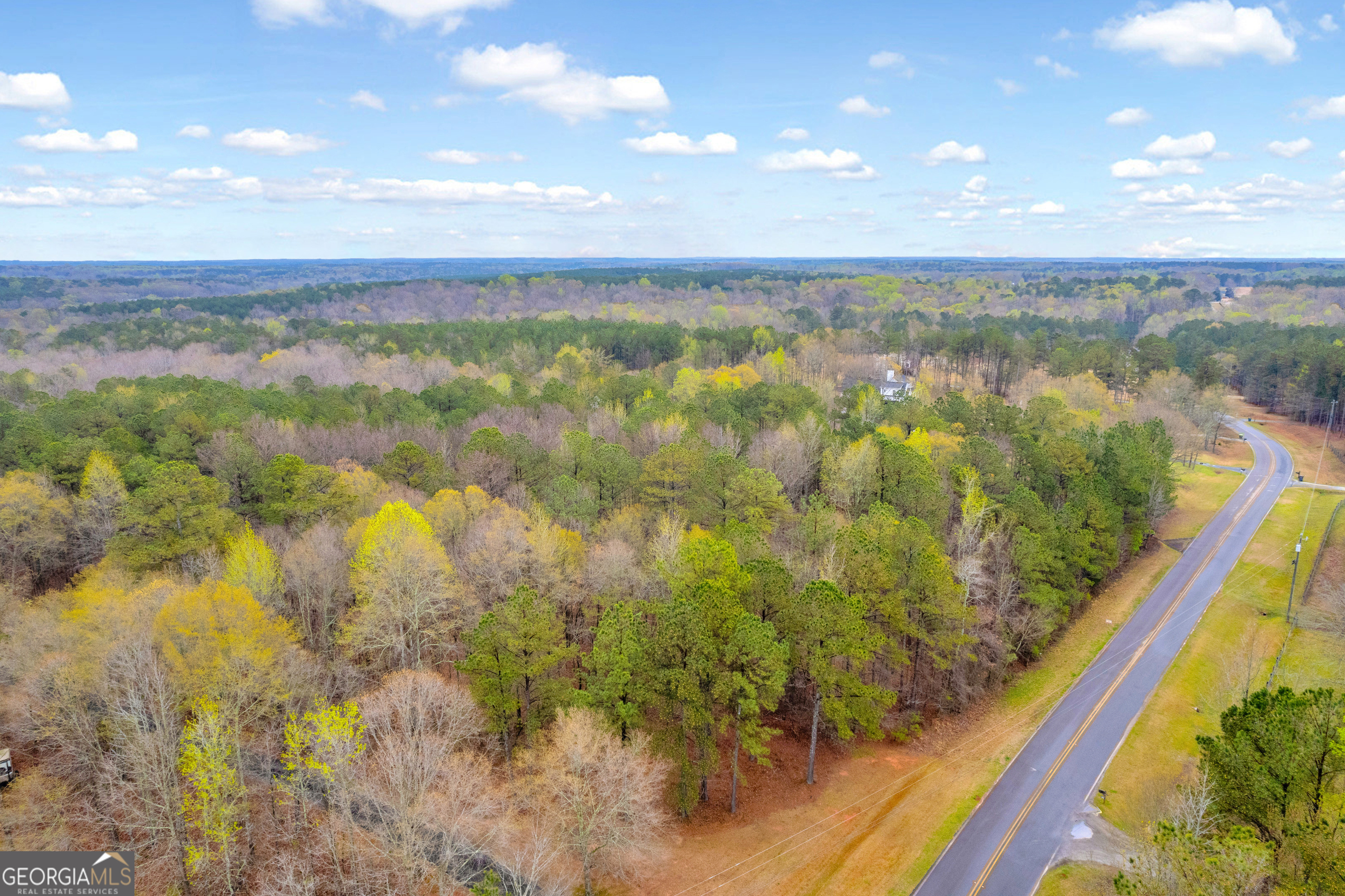 a view of a lake from a balcony
