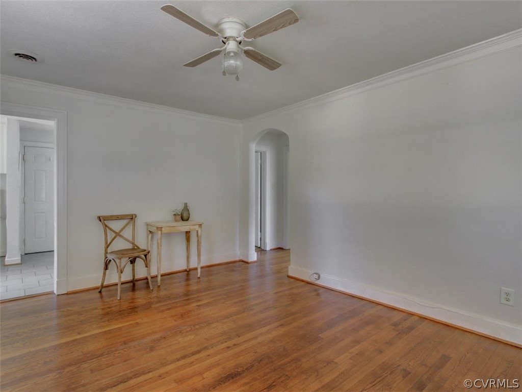 514 Riverview Road Colonial Heights, VA 23834 - Photo 2 of 17 an empty room with wooden floor and windows