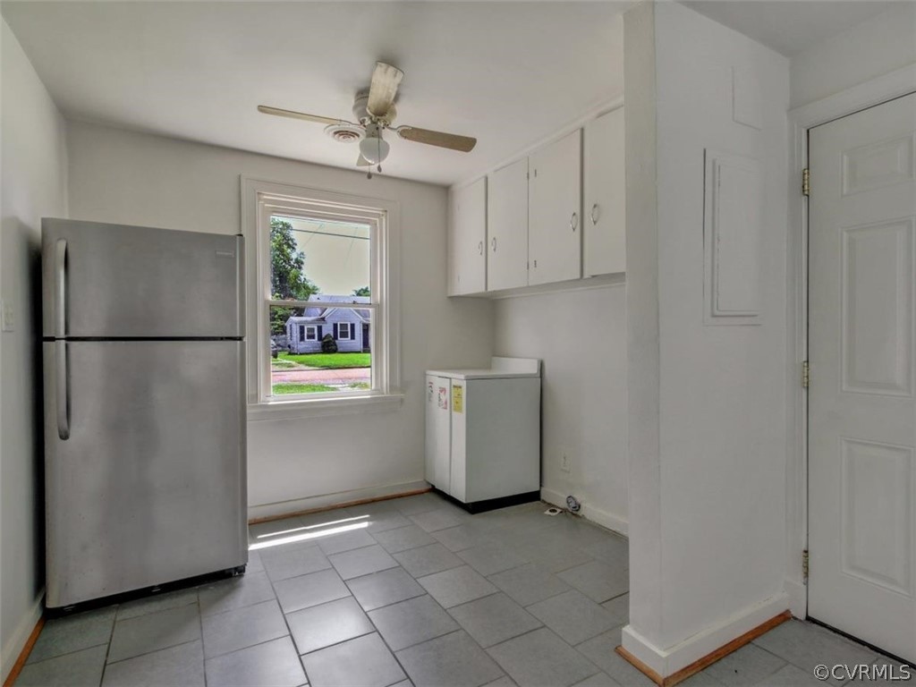 514 Riverview Road Colonial Heights, VA 23834 - Photo 6 of 17 a kitchen with a refrigerator and a stove