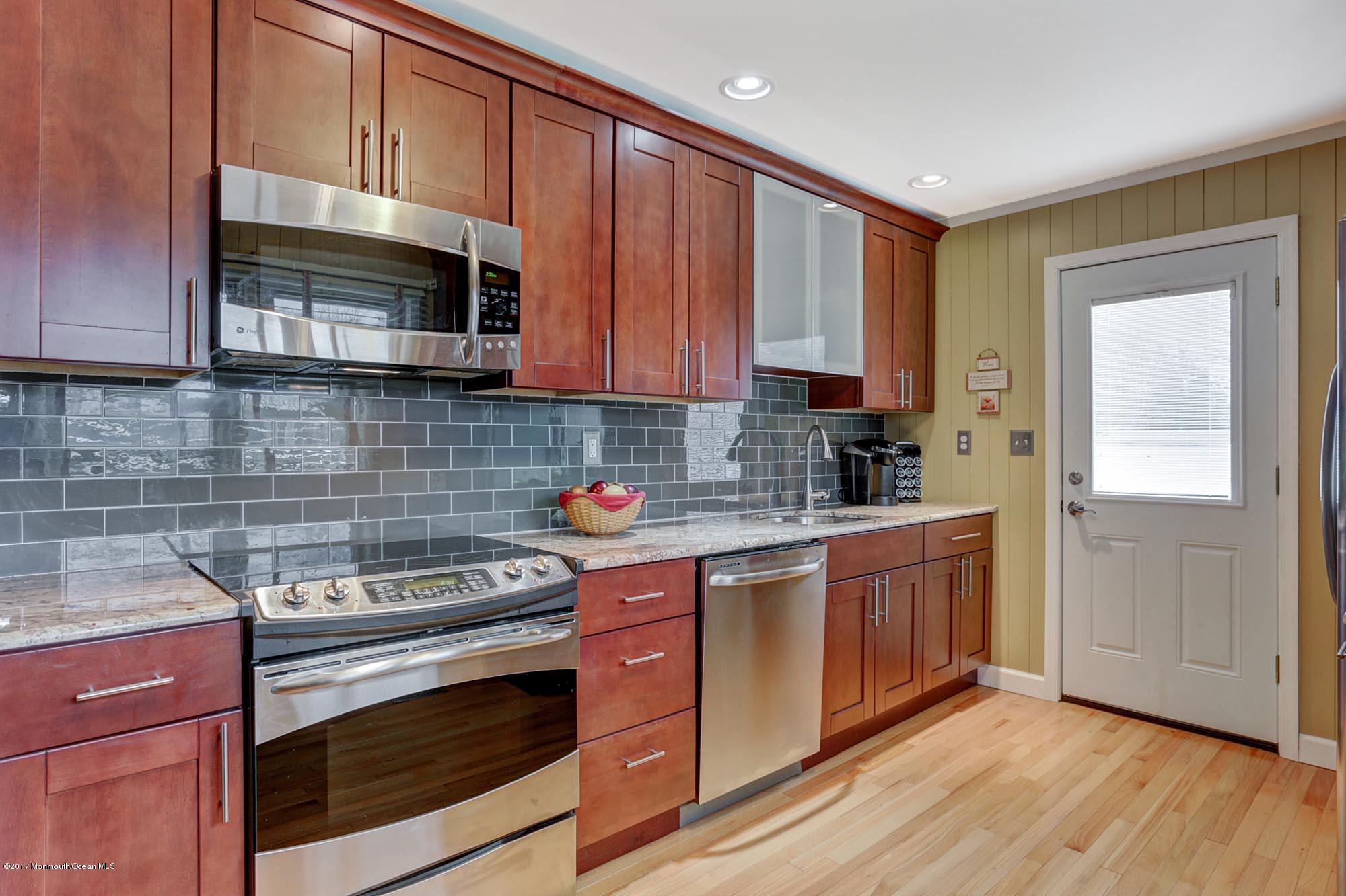 56 Edgar Road Matawan, NJ 07747 - Photo 2 of 22 GRANITE COUNTER & SUBWAY TILE BACKSPLASH