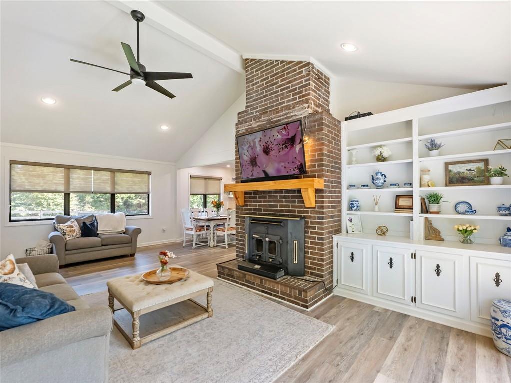 3125 Bart Johnson Road Buford, GA 30519 - Photo 16 of 50 a living room with furniture and a fireplace