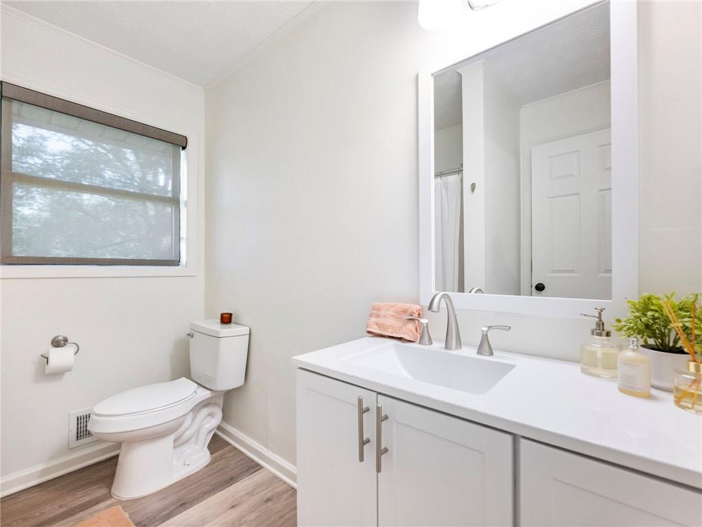 3125 Bart Johnson Road Buford, GA 30519 - Photo 26 of 50 a bathroom with a sink and a toilet