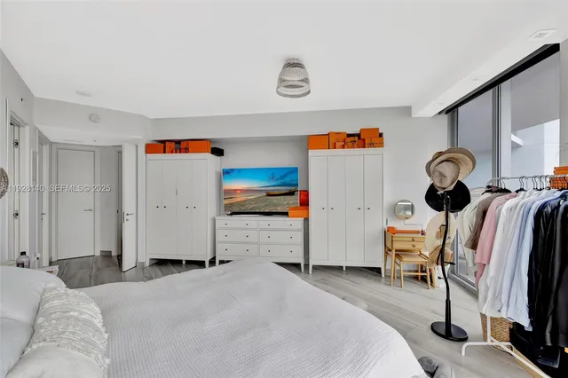 a bathroom with double vanity sink and a mirror
