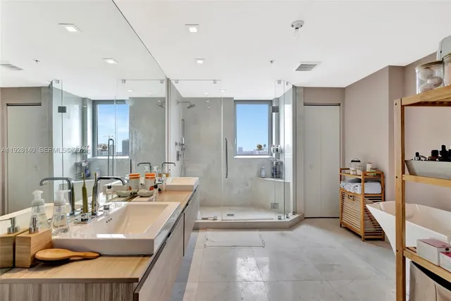 a bathroom with a bathtub and sink