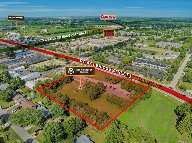 a view of a tennis ground with a large park