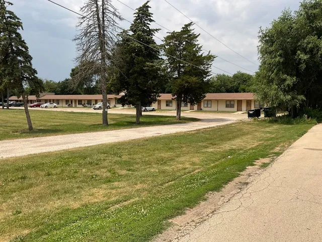 a view of a swimming pool and an outdoor space
