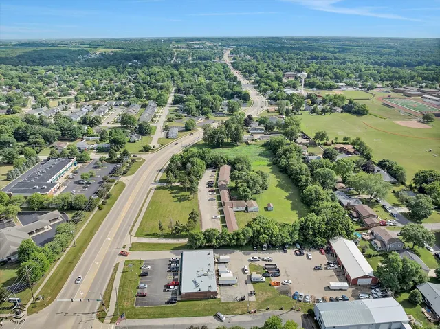 a view of a sitting area with swimming pool and outdoor seating