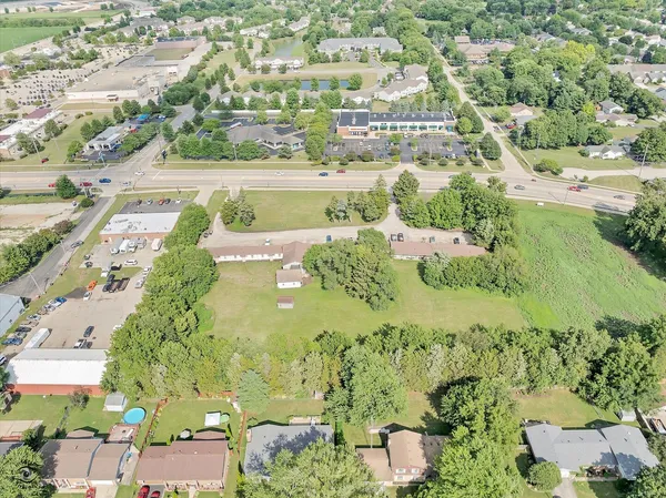 an aerial view of a city with lots of residential buildings