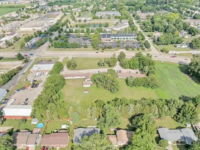 an aerial view of a city with lots of residential buildings
